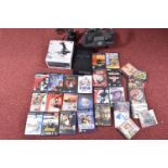 QUANTITY OF GAMES AND EQUIPMENT INCLUDING SILENT HILL 3 AND TWO FLIGHT STICKS, systems include a