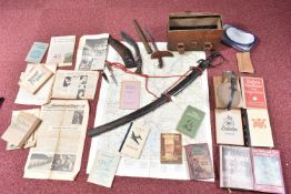 A BOX CONTAINING SOME TOURIST STYLE KNIVES, also include is a sword, German books , a doctors bag