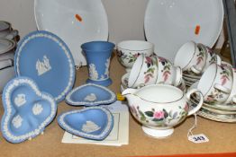 A WEDGWOOD 'HATHAWAY ROSE' PATTERN TEA SET, comprising a milk jug and sugar bowl, six cups, six