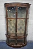 AN EARLY 20TH CENTURY MAHOGANY DEMI LUNE DISPLAY CABINET, with double doors over two sections, width