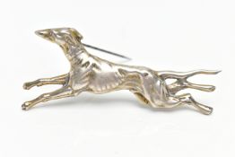 A GREYHOUND BROOCH, in running pose, stamped sterling silver, length 70mm, approximate gross