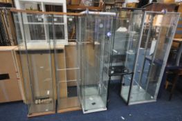 A SELECTION OF SHOP DISPLAY CABINETS, to include a grey two door cabinet with a mirror back, width