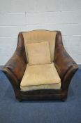 A LARGE BROWN LEATHER AND UPHOLSTERED ARMCHAIR, width 103cm x depth 103cm x height 95cm (