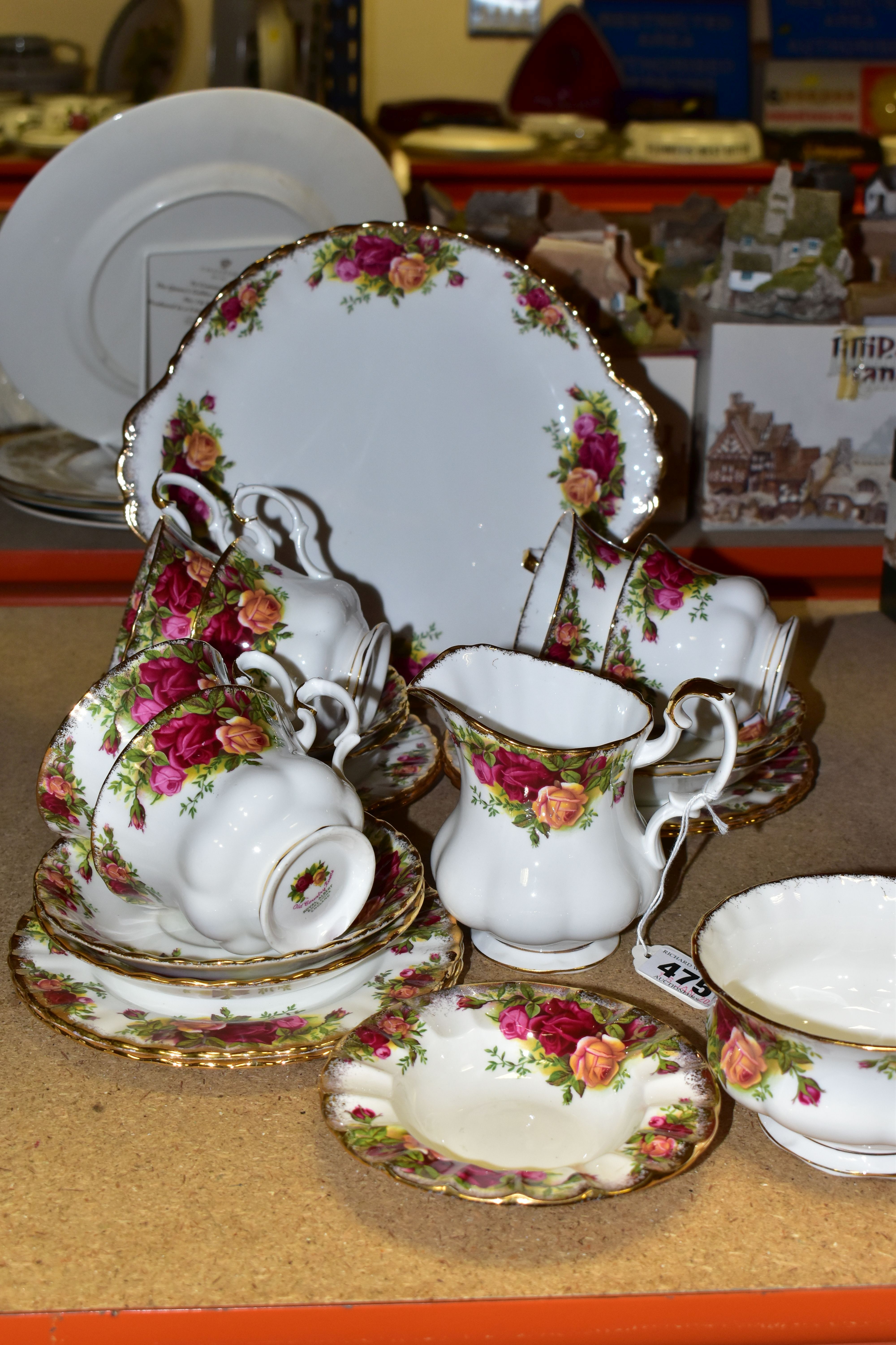 A ROYAL ALBERT 'OLD COUNTRY ROSES' PATTERN PART TEA SET, comprising milk jug, sugar bowl, bread