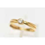 A 18CT GOLD DIAMOND RING, single stone diamond, bezel set in yellow gold, approximate total