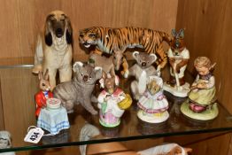 A GROUP OF BESWICK, ROYAL DOULTON AND OTHER ANIMAL AND CHARACTER FIGURES, comprising Royal
