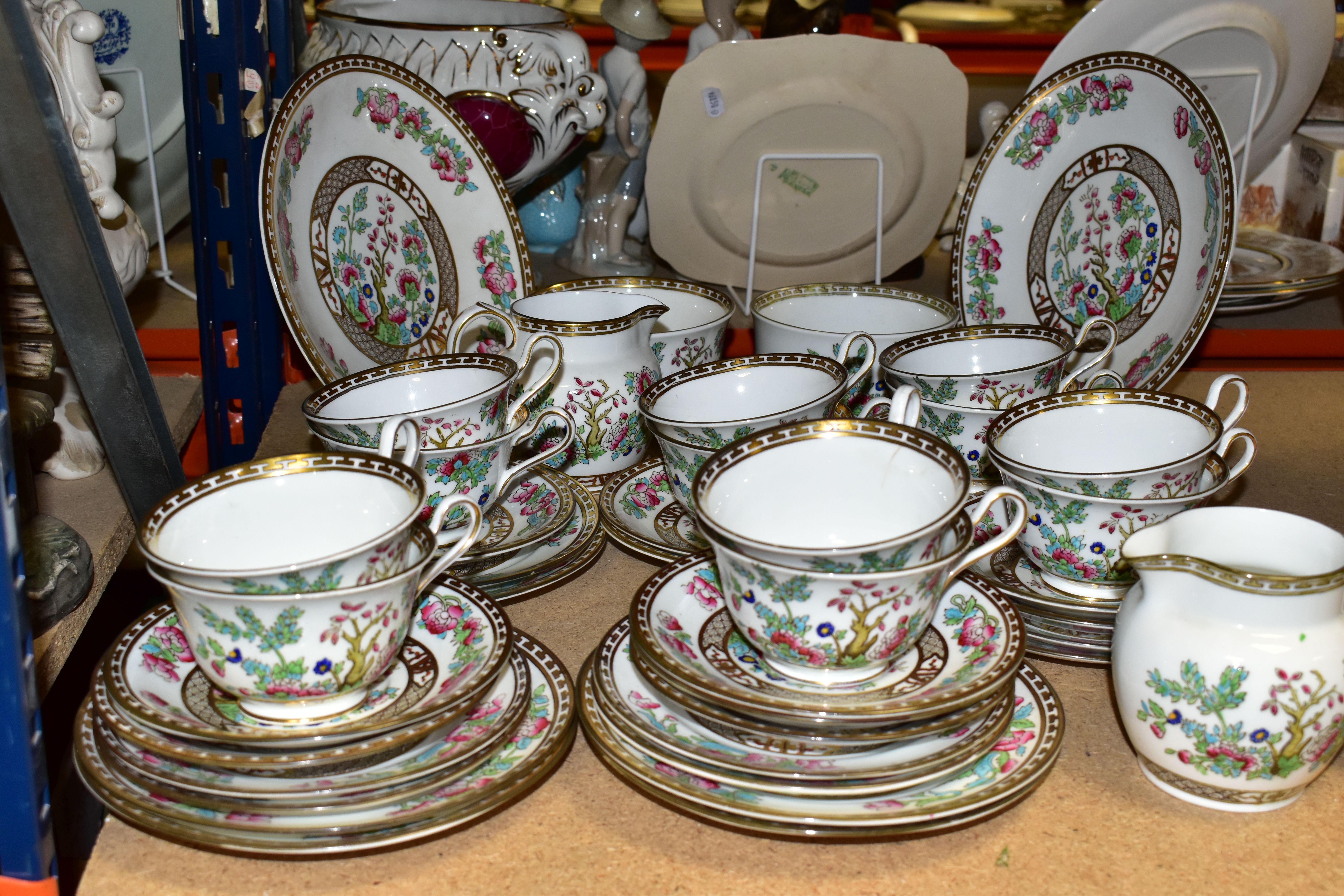 AN ANCHOR CHINA 'INDIAN TREE' PATTERN TEA SET, comprising two milk jugs (one has a green paint