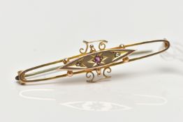 A LATE 19TH CENTURY GOLD BROOCH, a navette shaped centre positioned upon an open work oval brooch,