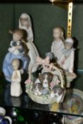 SIX LLADRO AND NAO FIGURES, comprising Lladro 'A Litter of Love' three puppies in a basket, no 1441,