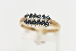 A 9CT YELLOW GOLD, SAPPHIRE AND DIAMOND RING, designed with a row of claw set, single cut