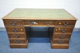 A YEWWOOD PEDESTAL DESK, with a green leather writing surface, and seven assorted drawers, width