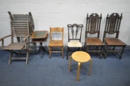 A PAIR OF 19TH CENTURY CARVED OAK HALL CHAIRS, with leather seat pads, an Arts and Crafts rush