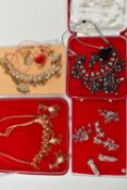 AN ASSORTMENT OF INDIAN COSTUME JEWELLERY, to include three necklace and earring sets, one