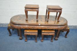 AN ORIENTAL HARDWOOD COFFEE TABLE, on cabriole legs, with a loose glass top, length 157cm x depth