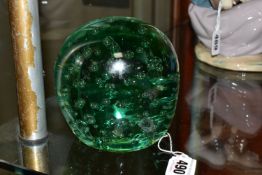 A VICTORIAN GREEN GLASS DUMP WEIGHT, of domed top form, having controlled bubble inclusions and