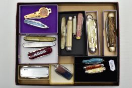 SIXTEEN PENKNIVES, to include four with mother of pearl handles, one set with a 1954 farthing