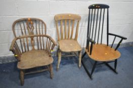 A DISTRESSED 19TH CENTURY ELM WINDSOR ARMCHAIR, along with a elm and beech kitchen chair, and an
