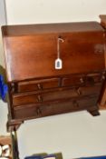 A MINIATURE BUREAU, with stained finish, pull down front revealing internal drawers and