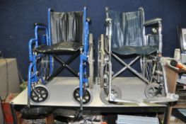 TWO FOLDING WHEELCHAIRS with footrests
