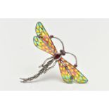 A WHITE METAL PLIQUE A JOUR BROOCH/PENDANT, in the form of a dragonfly, set with ruby eyes and