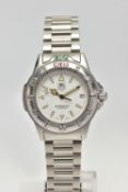 A GENTS 'TAG HEUER' WRISTWATCH, round white dial signed 'Tag Heuer, Professional 200 metres',