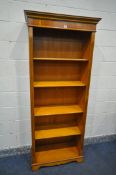 A YEWWOOD OPEN BOOKCASE, with four adjustable shelves, width 86cm x depth 37cm x height 200cm (