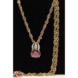 A 9CT YELLOW GOLD SPINEL AND DIAMOND PENDANT WITH CHAIN, the pendant set with a principal purplish