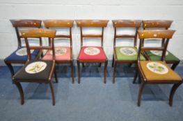 A SET OF REGENCY MAHOGANY BAR BACK CHAIRS, each chair with a different coloured drop in seat pad (