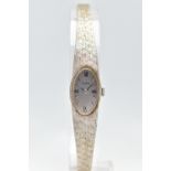 A LADIES 18CT WHITE GOLD 'ZODIAC' WRISTWATCH, manual wind, oval silver dial signed 'Zodiac',