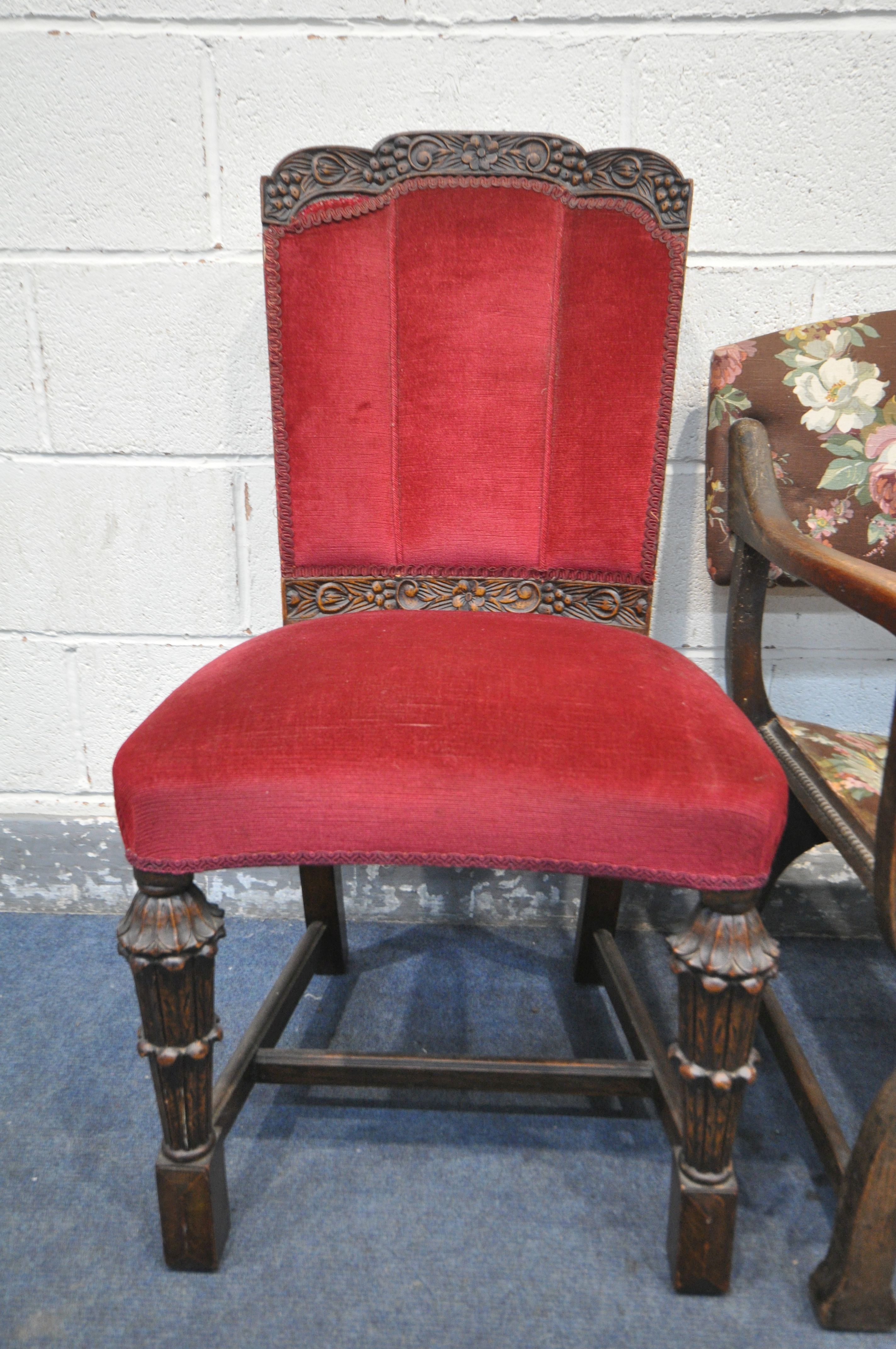 A MID CENTURY OAK CHAIR, with red upholstery, foliate carving to back rest, a concave seat, on front - Image 3 of 3