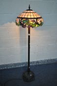 A TIFFANY STYLE STANDARD LAMP, on a metal base, height 144cm