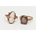 TWO 9CT GOLD RINGS, the first a shell cameo, collet set in rose gold, leading on to trifurcated