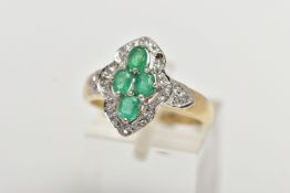 A 9CT YELLOW GOLD, EMERALD AND DIAMOND DRESS RING, of a marquise form, centrally set with four, claw