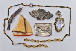 SIX PIECES OF JEWELLERY, to include a white metal sweet heart brooch, inscribed with the word '