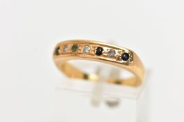 A GEM SET RING, yellow metal band ring grain set with three single cut diamonds, two sapphires and