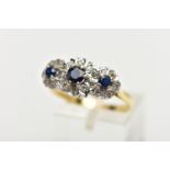 A SAPPHIRE AND DIAMOND RING, three circular cut blue sapphires, set with a surround of single cut