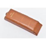 A VINTAGE 'OMEGA' WATCH CASE, tan in colour, hinged rectangular box signed to the front 'Omega',