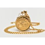 A PENDANT AND 9CT YELLOW GOLD CHAIN, the pendant set with a fake coin, within a plain polished