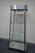 A SHOP DISPLAY CABINET, of a tapered form, enclosing three glass shelves, width 100cm x depth 55cm x