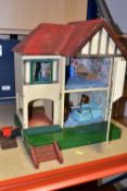 A 1950'S TRIANG DOLL'S HOUSE, No.6 with original curtains and paintwork, height 42cm x width 35cm,