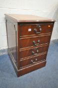 A MAHOGANY TWO DRAWER FILING CABINET, with a brown leather writing surface, width 51cm x depth