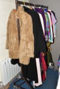 A QUANTITY OF LADIES' CLOTHING, many 1980s and more modern pieces, to include a light brown fur