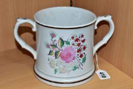 A NINETEENTH CENTURY THREE FROG LOVING CUP, hand painted with flowers on a white ground, three quite
