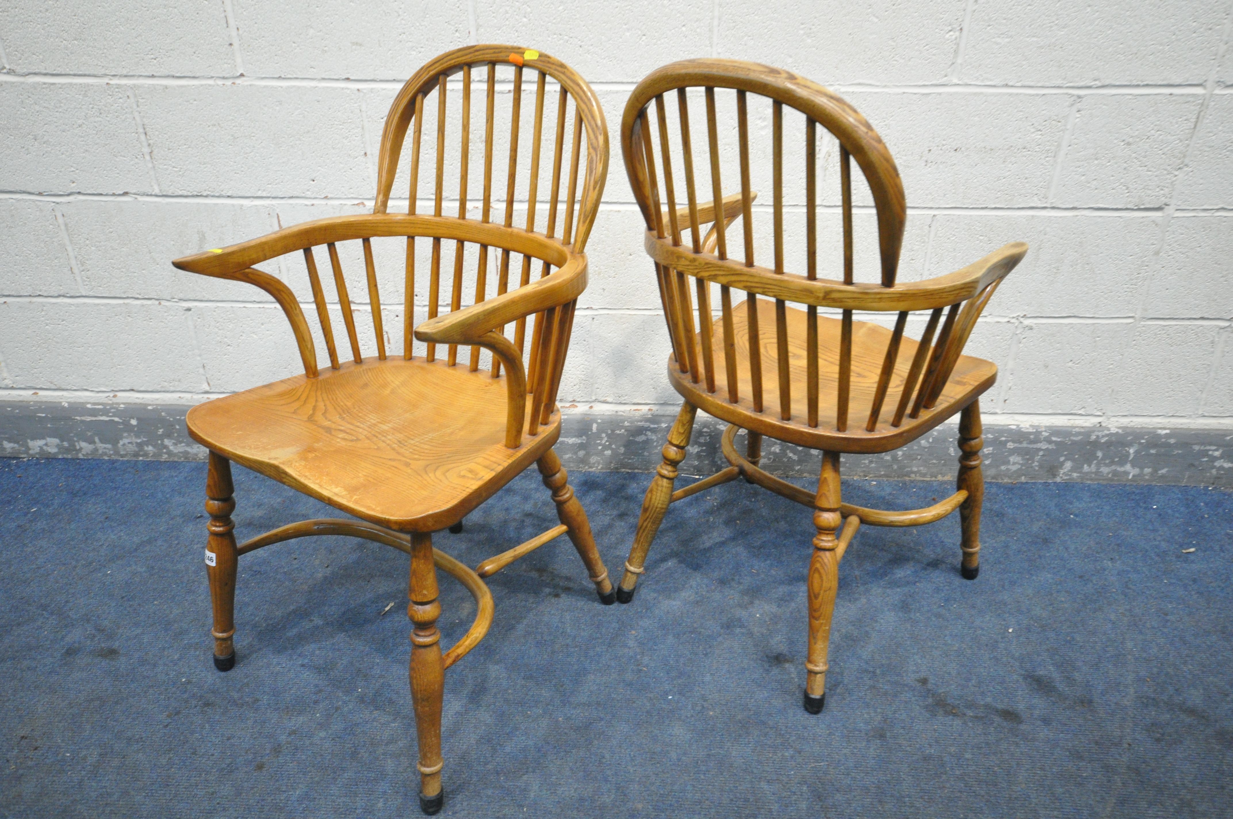 A PAIR OF REPRODUCTION ELM AND ASH WINDSOR AMRCHAIRS, with dish shaped seats (condition:-surface - Image 3 of 4