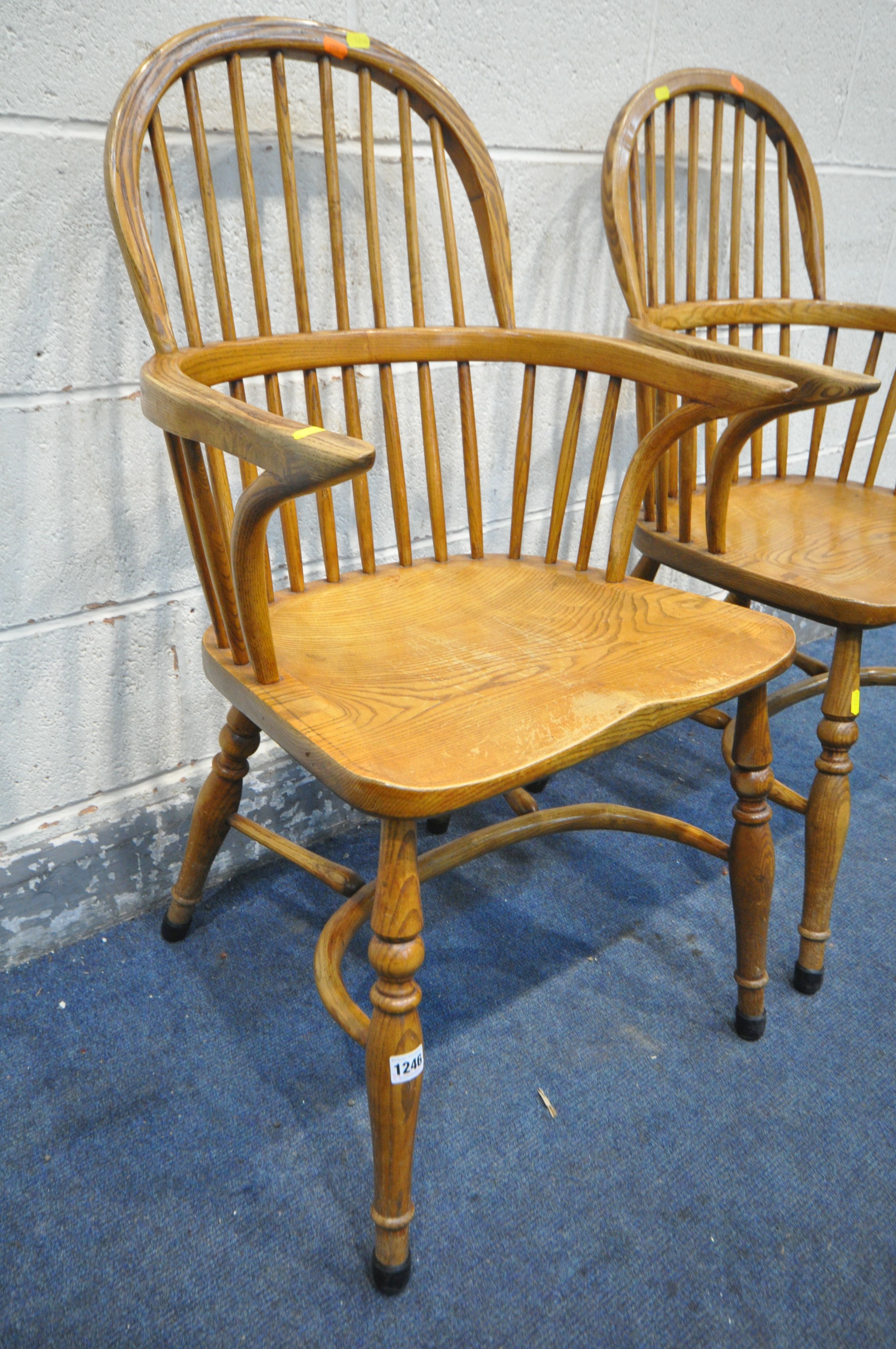 A PAIR OF REPRODUCTION ELM AND ASH WINDSOR AMRCHAIRS, with dish shaped seats (condition:-surface - Image 2 of 4