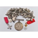 A WHITE METAL CHARM BRACELET, WWI MEDAL AND MINIATURE JEWELS, the charm bracelet made of