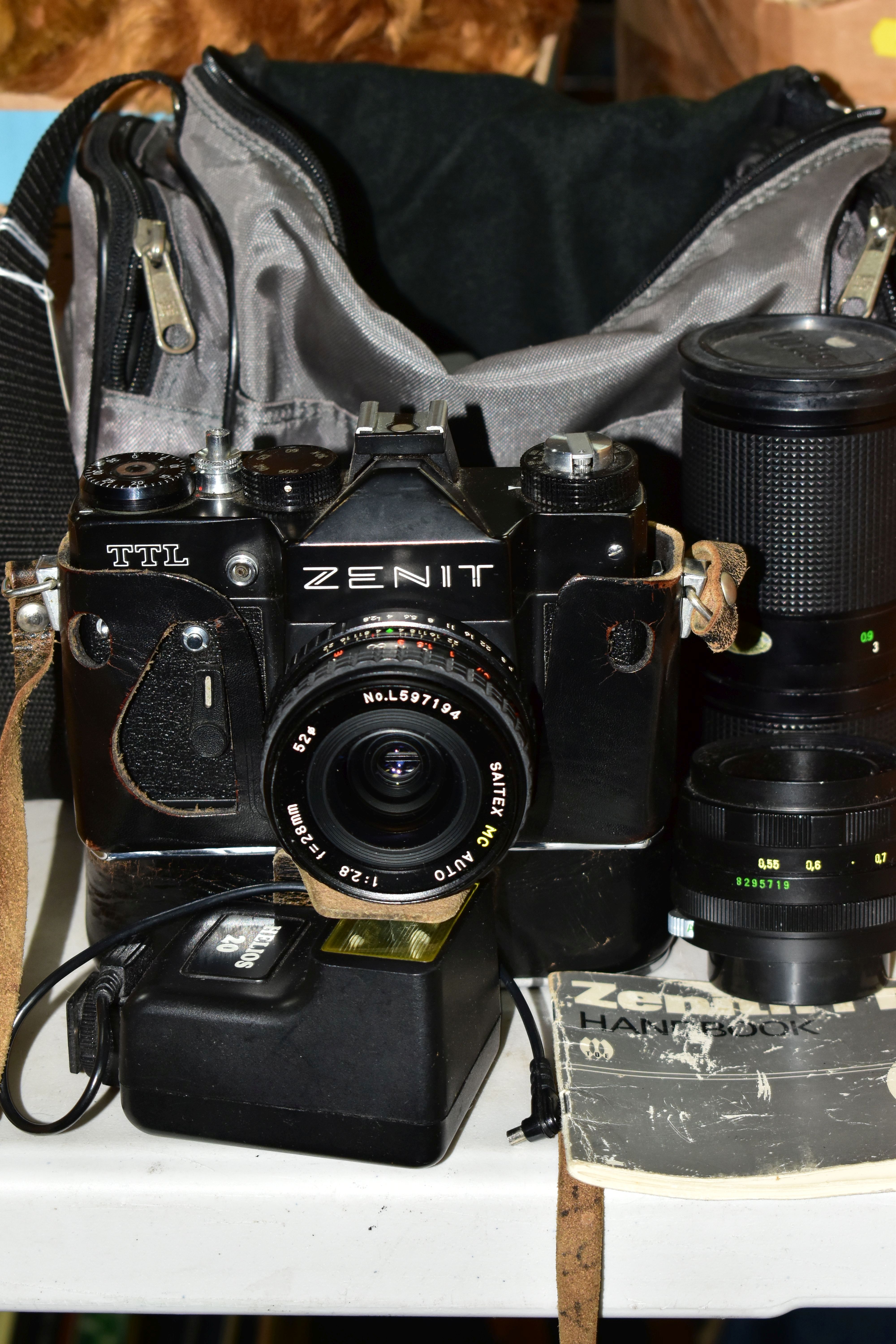 VINTAGE 35MM PHOTOGRAPHIC EQUIPMENT, comprising a Zenit TTL SLR camera body with leather case,