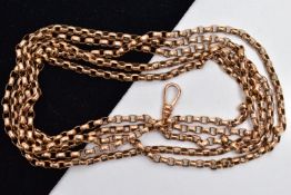 A YELLOW METAL LONGUARD CHAIN, belcher link chain with a 9ct stamped tag, fitted with a single