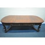 A 19TH CENTURY WALNUT LIBRARY TABLE, surrounded by six frieze drawers, on shaped scrolled legs,