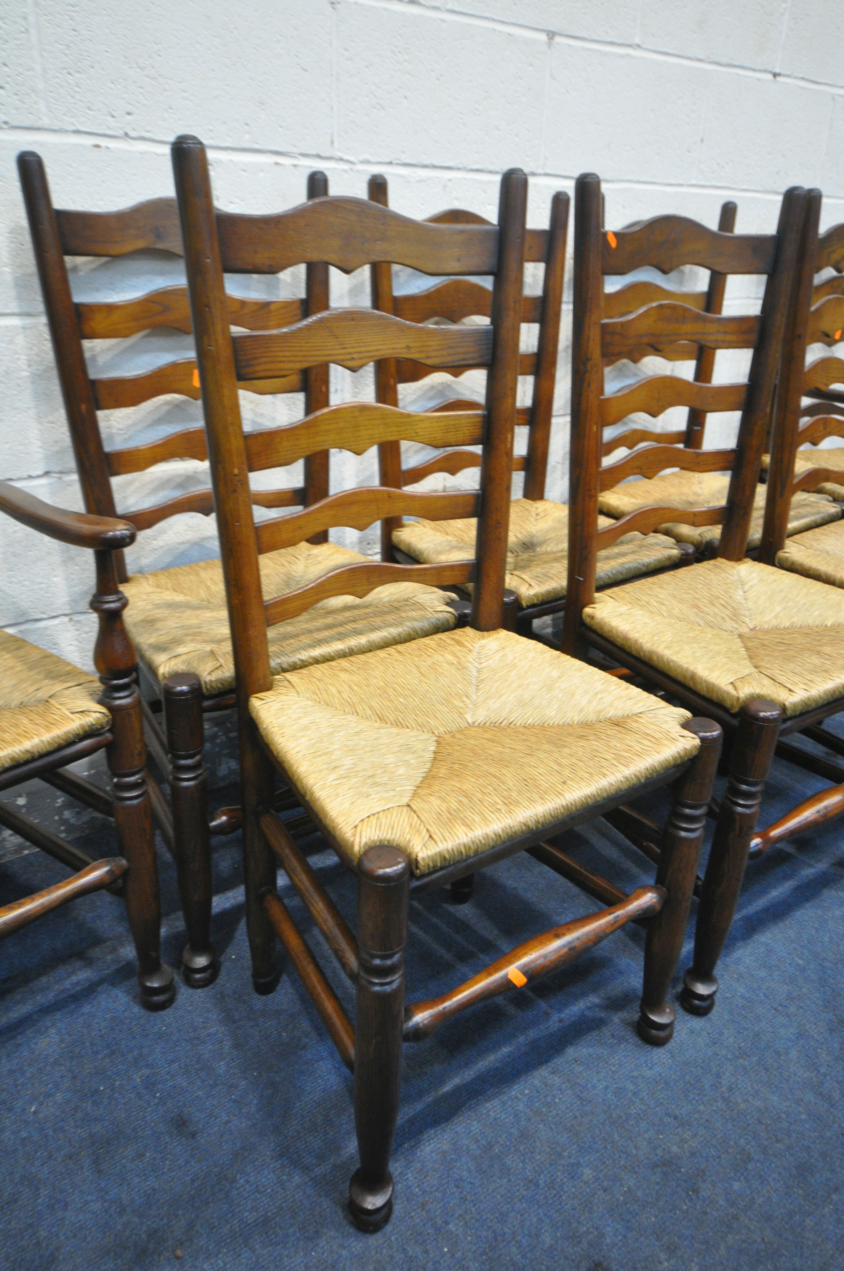 A SET OF EIGHT REPRODUCTION 19TH CENTURY STYLE OAK LANCASHIRE CHAIRS, with ladder backs and loose - Image 4 of 4